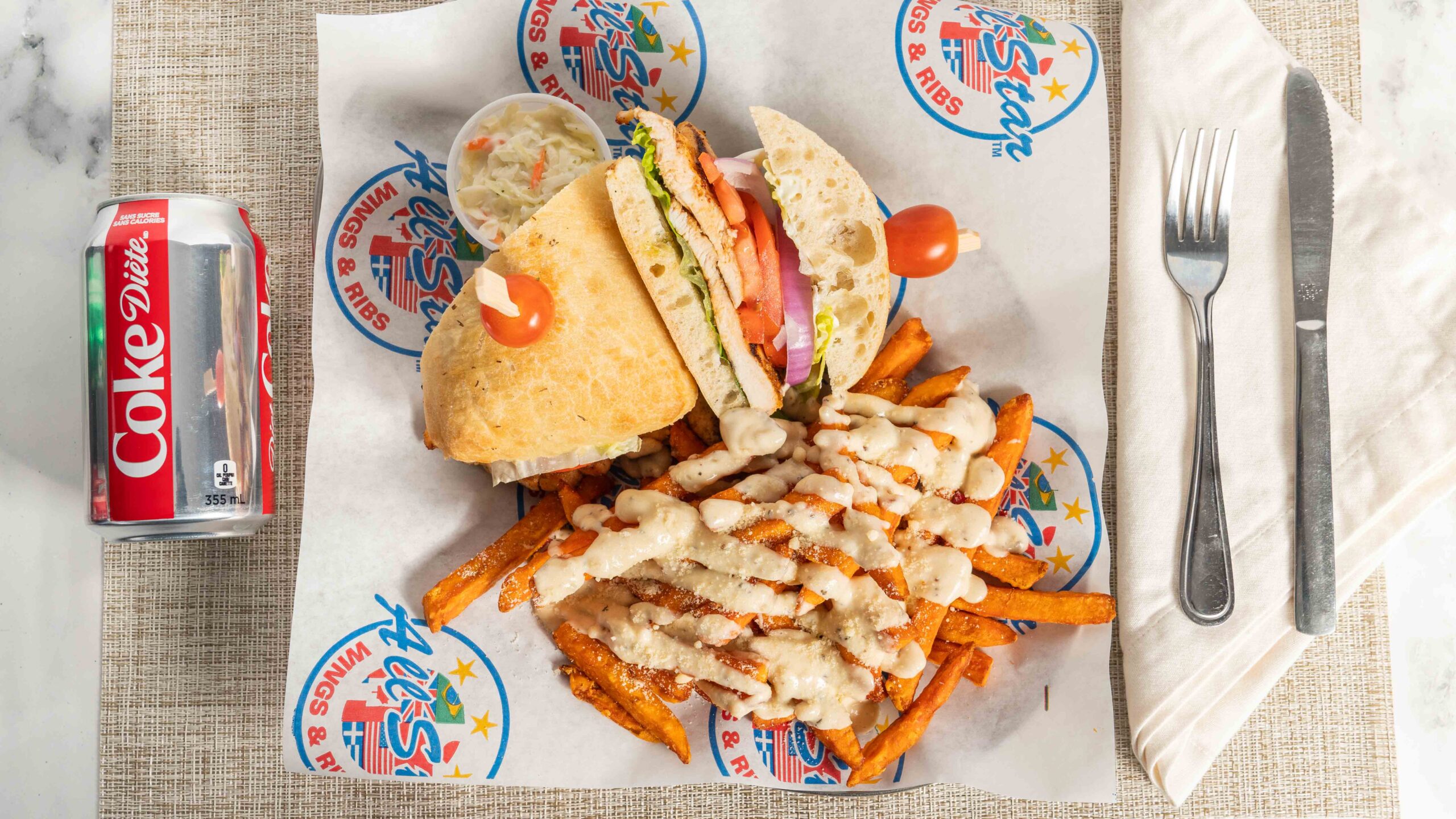 AllStar Wings & Ribs sandwich and fries